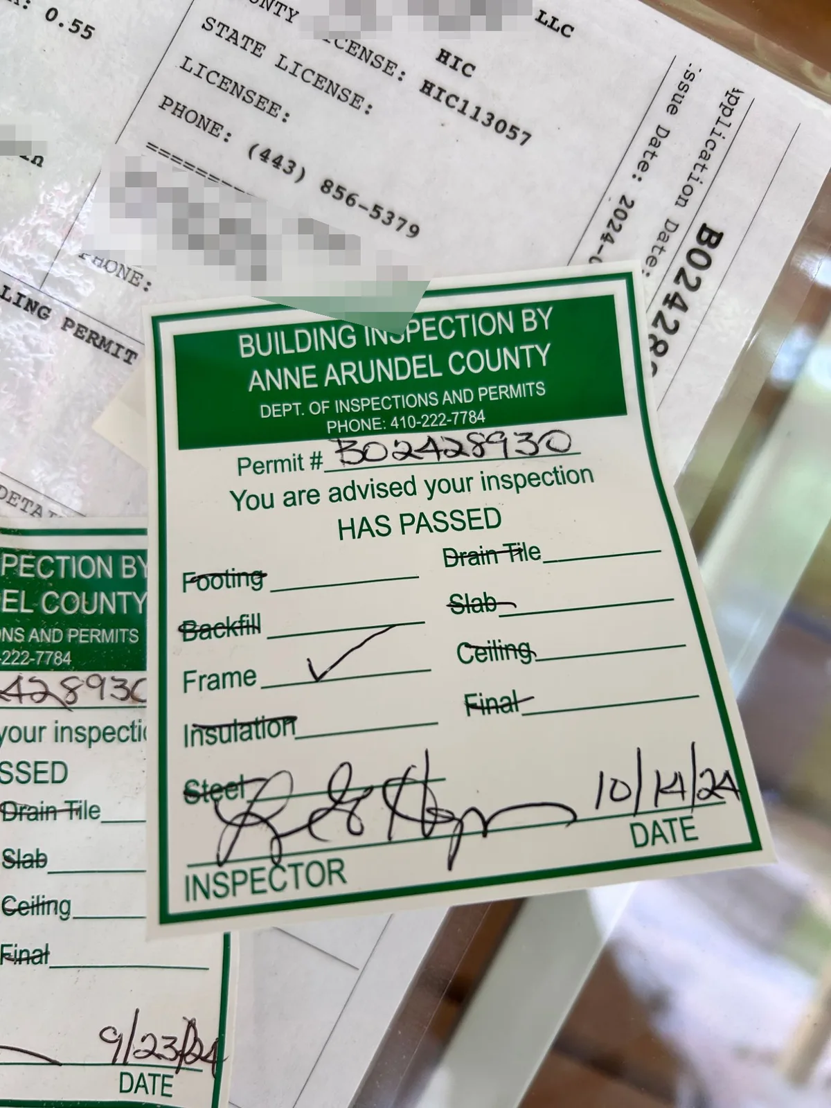 Anne Arundel County building inspection passed sticker on a PRG Home Improvement framing project