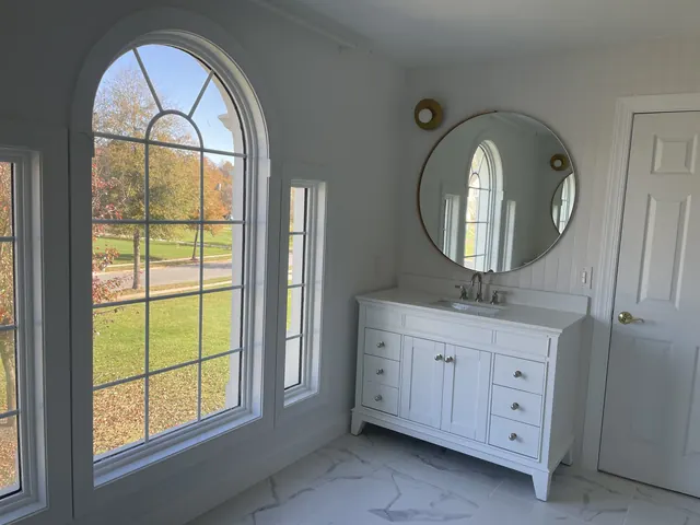 Custom towel tower in remodeled master bathroom in Gambrills Maryland