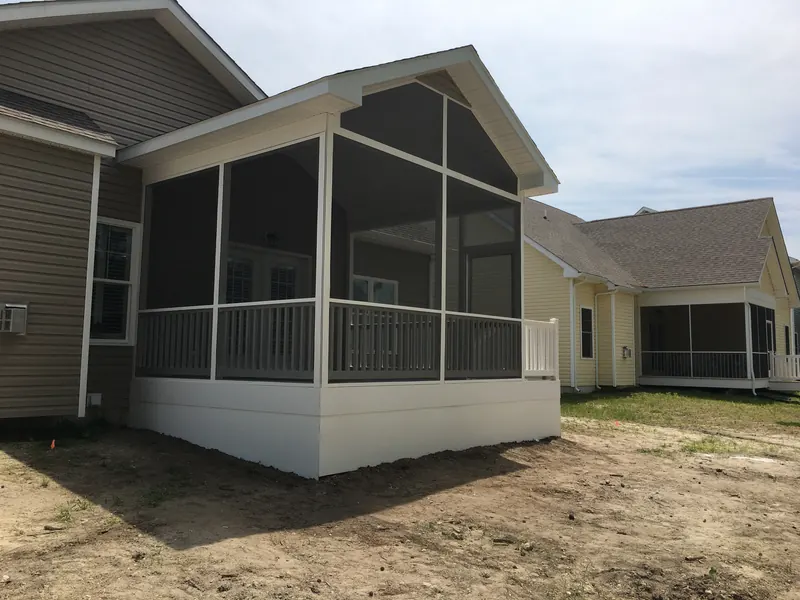 Covered porch and concrete patio addition at a Davidsonville Maryland home