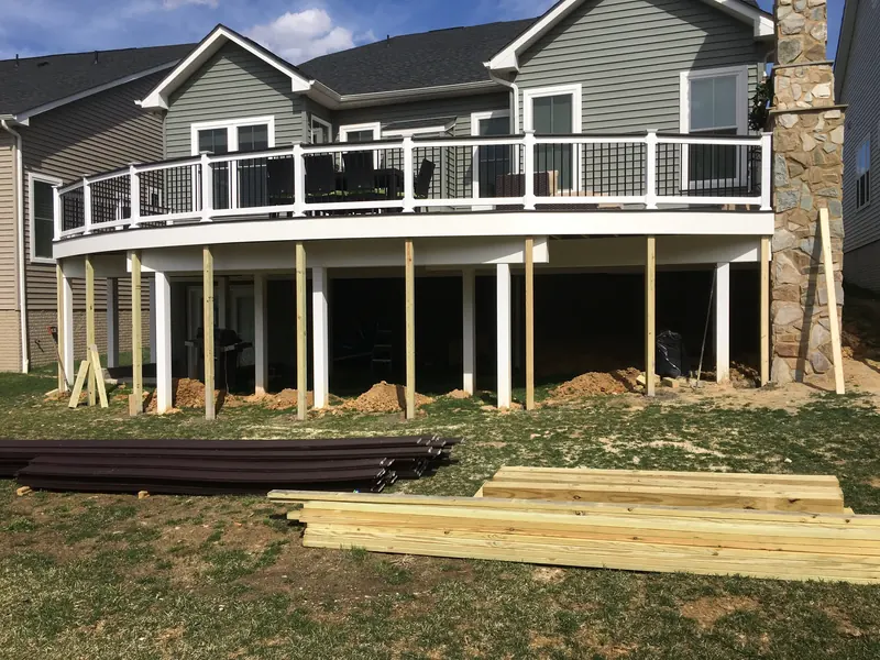 Multi-level composite deck with backyard views at Two Rivers in Odenton MD